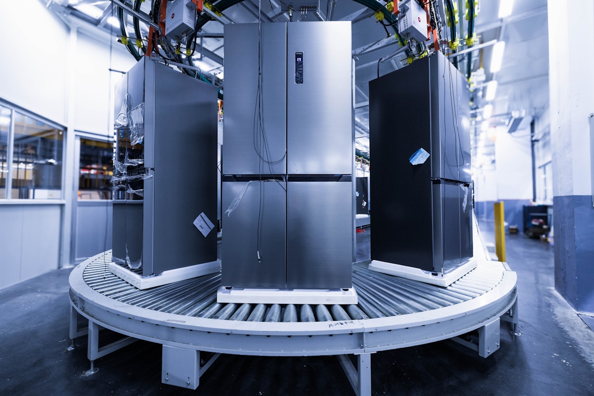 Stainless steel refrigerators on a distribution line ready for delivery